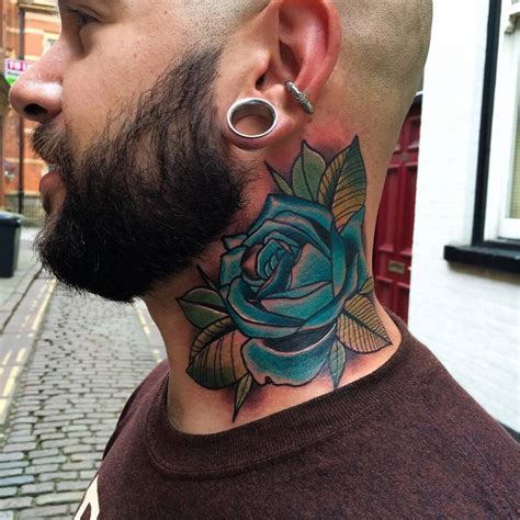 blue rose tattoo on dark skin|blue rose neck tattoos.